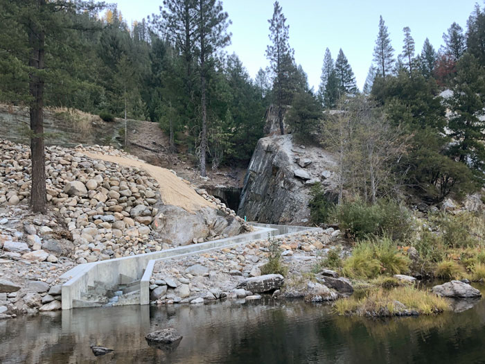 Retrofit concrete arched culvert with fish passage photo